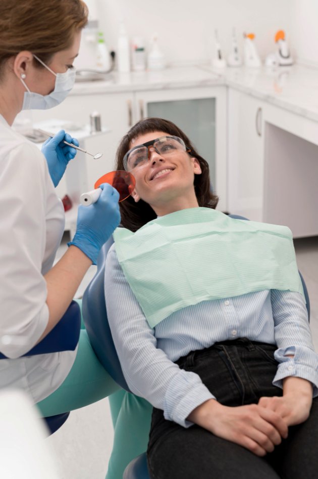 Female patient having a procedure done at the dentist